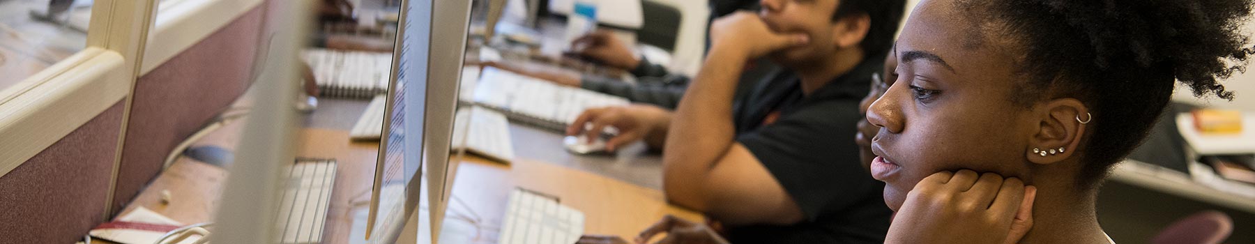 Claflin student working on a computer