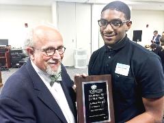 Andres Waters Receiving Journalist of the Year Award