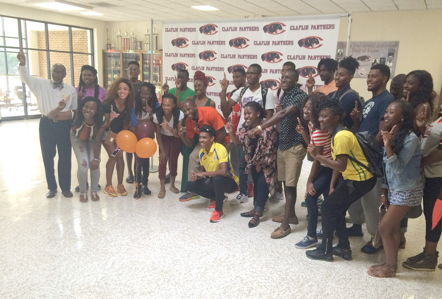 claflin-students-with-olympic-athlete Brandon Valentine-Parris Poses with other Claflin Students