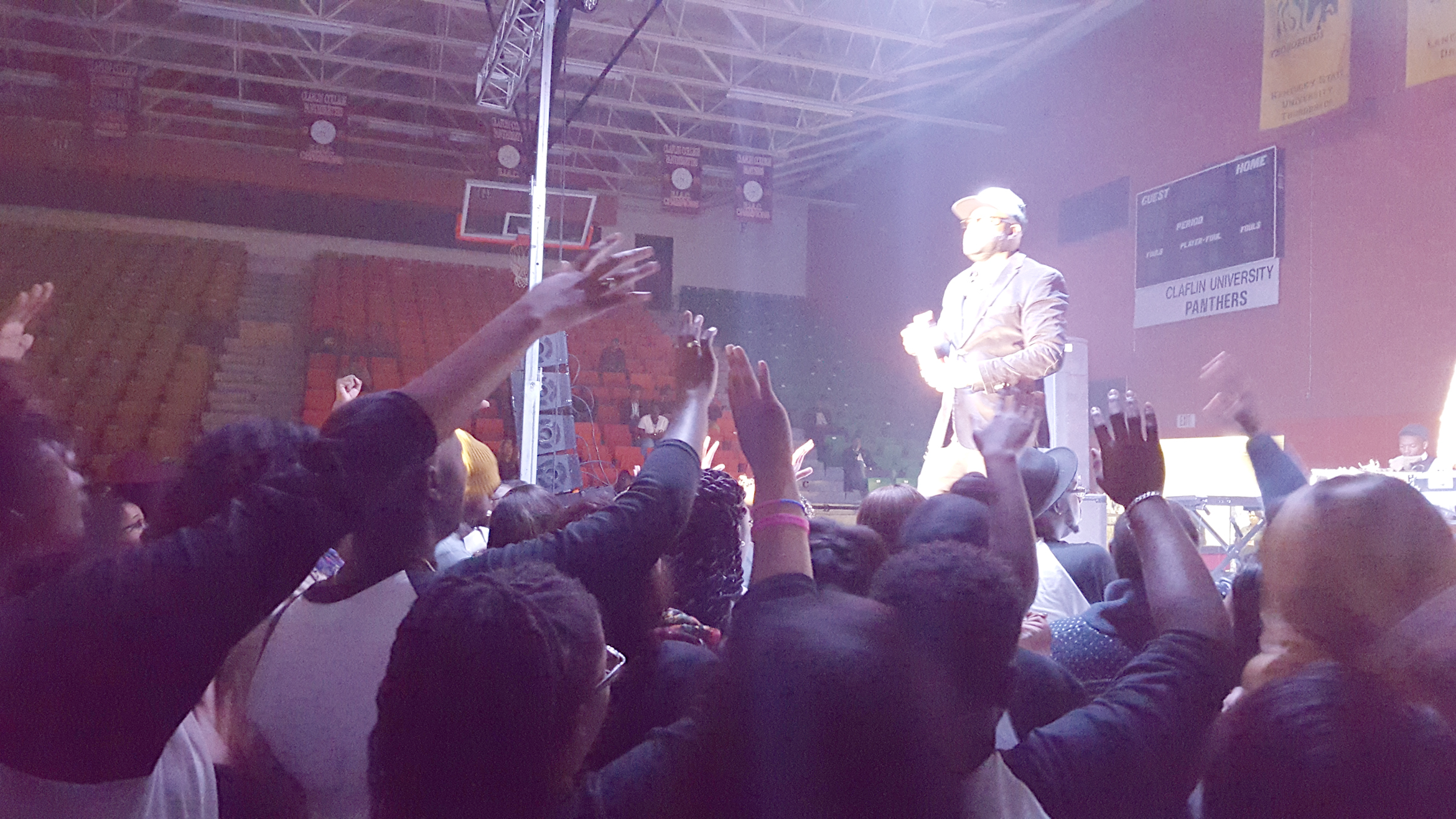 dream-performing-claflin Performer and Crowd