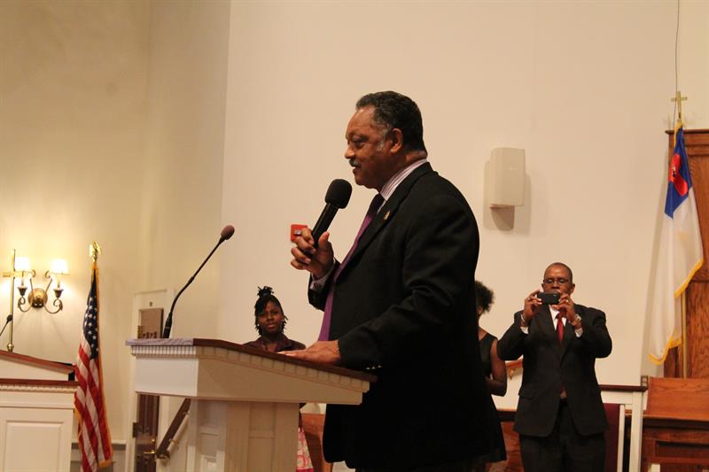 Reverand Jesse Jackson at Podium Speaking at Claflin