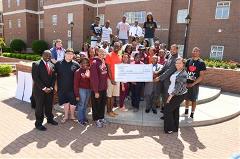 Students Posing with Donation for Philanthropy Day at Claflin
