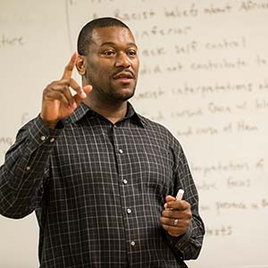 Teacher speaking to his class