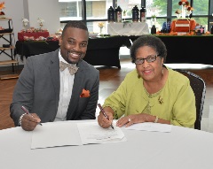Pictured from left, Willie Jude II, Claflin University Vice President for Institutional Advancement, and Ms. Jettiva Belton, President of the Columbia Hospital School of Nursing Alumnae Association