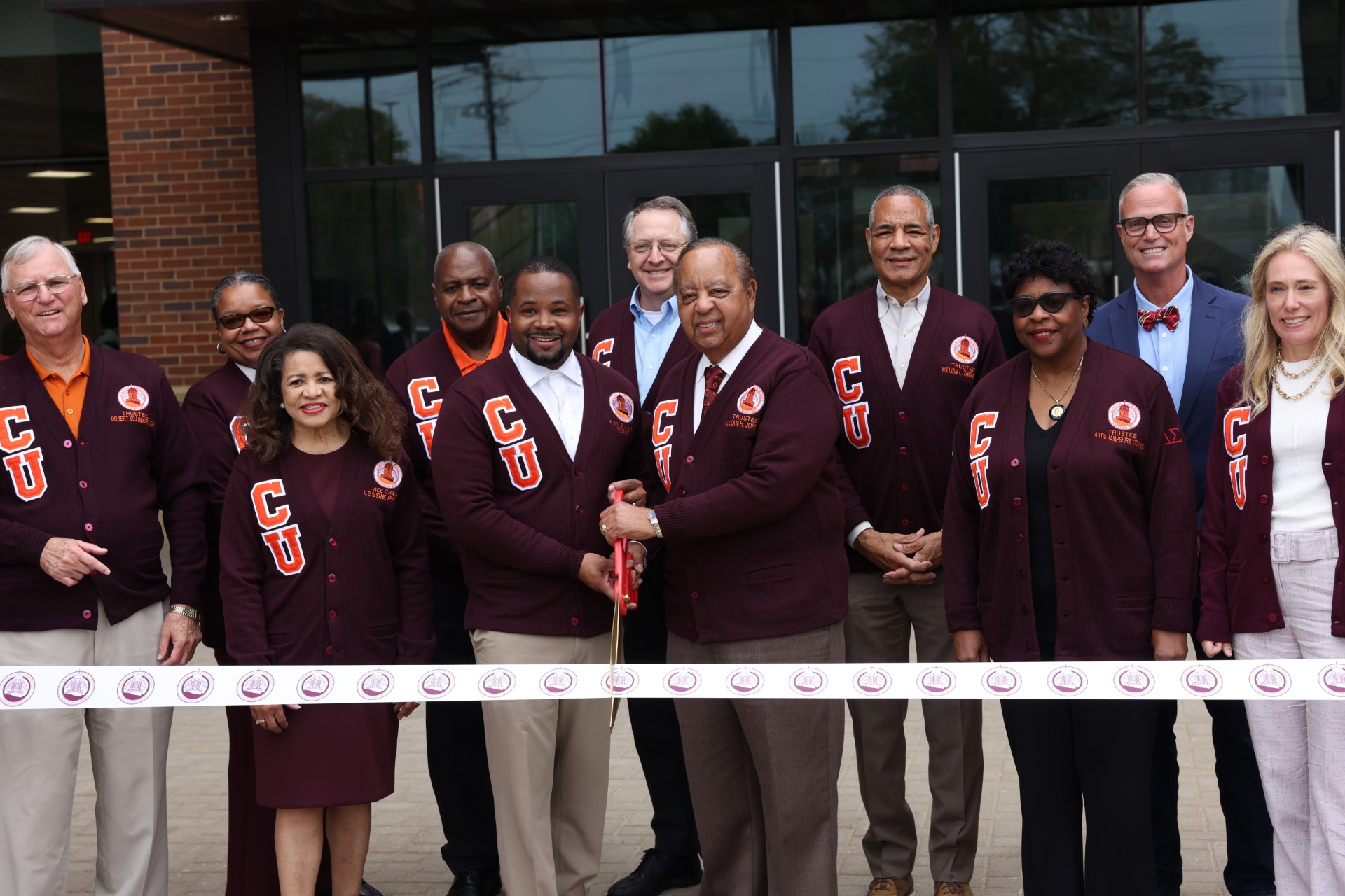 Ribbon Cutting-Dr. Warmack, Trustee Johnson and  Board members during New Student Center Ribbon Cutting